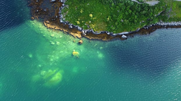 Drone photo of a beautiful coast with stones by the sea in Norway