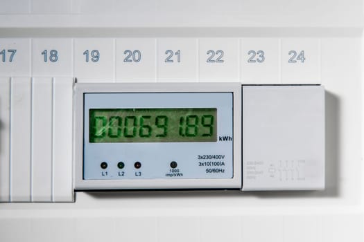 Front close-up view of a digital electricity meter display.