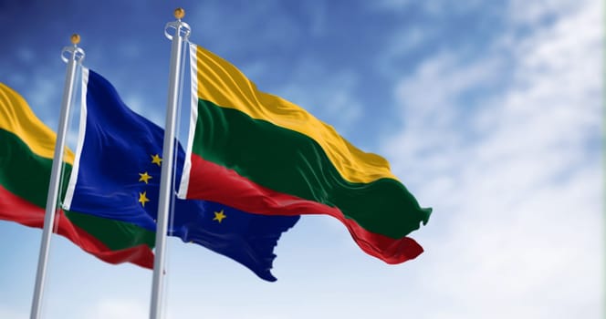 The flags of Lithuania and the European Union waving together on a clear day. Lithuania became a member of the European Union on 2004. 3D illustration render. Rippled fabric. Selective focus