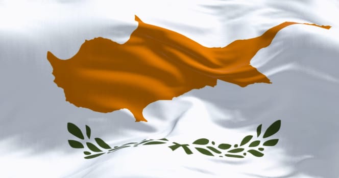 Close-up of Cyprus national flag waving in the wind on a clear day. White with a copper-orange island silhouette and two green olive branches below it. 3d illustration render. Fluttering fabric