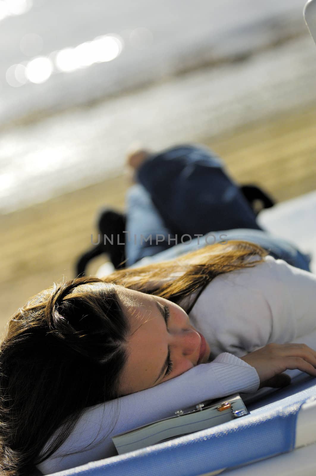 Woman relaxing on the beach