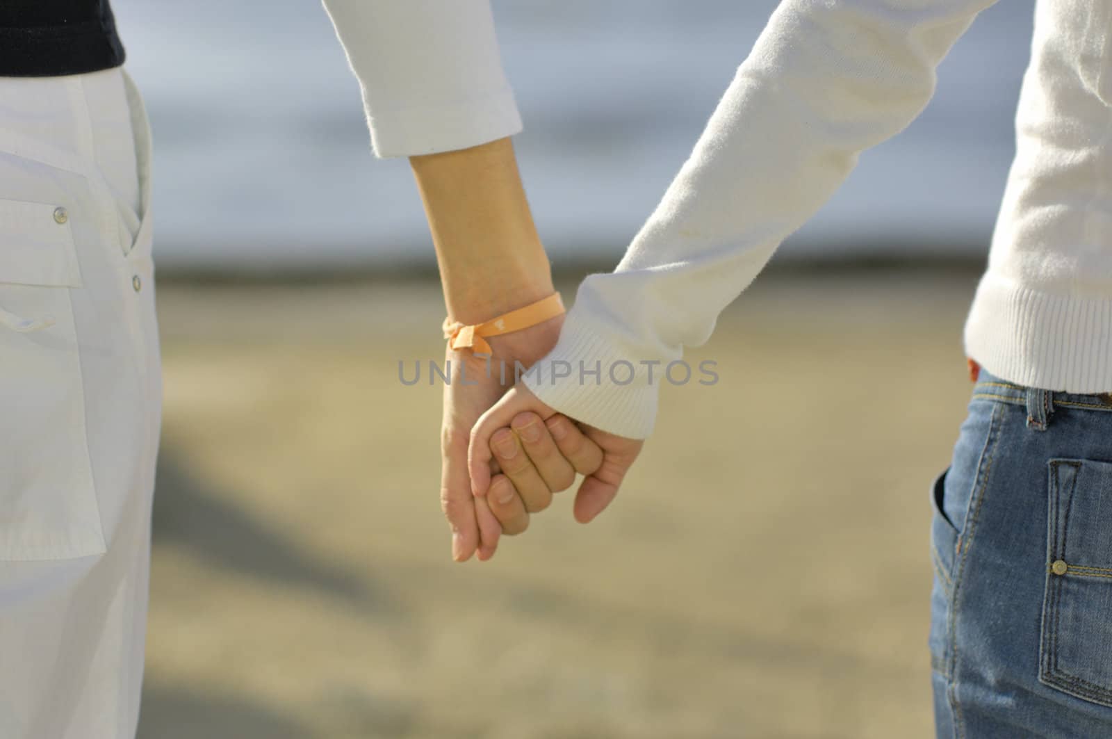 Couple holding each other hands