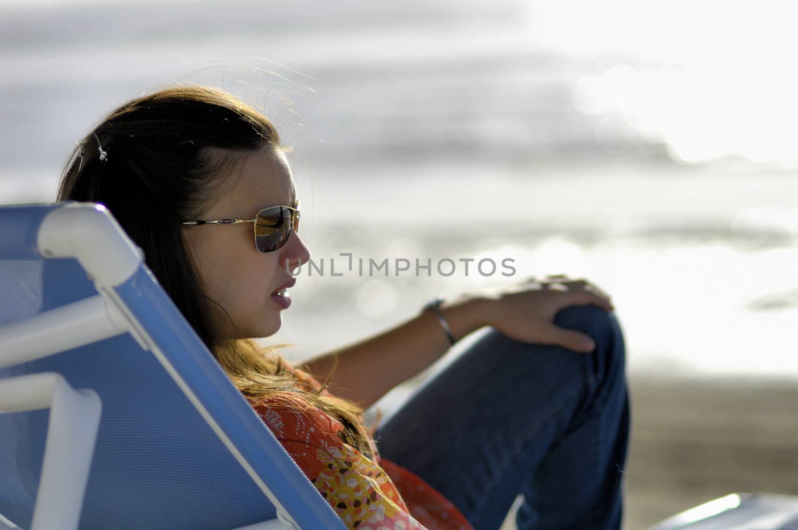 Woman relaxing on the beach