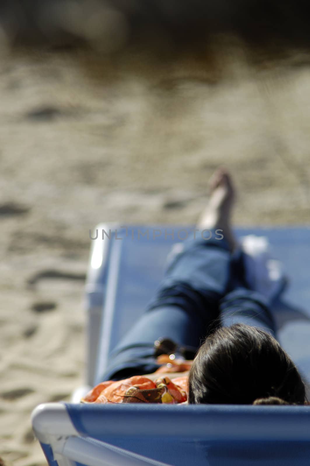 Woman relaxing on the beach