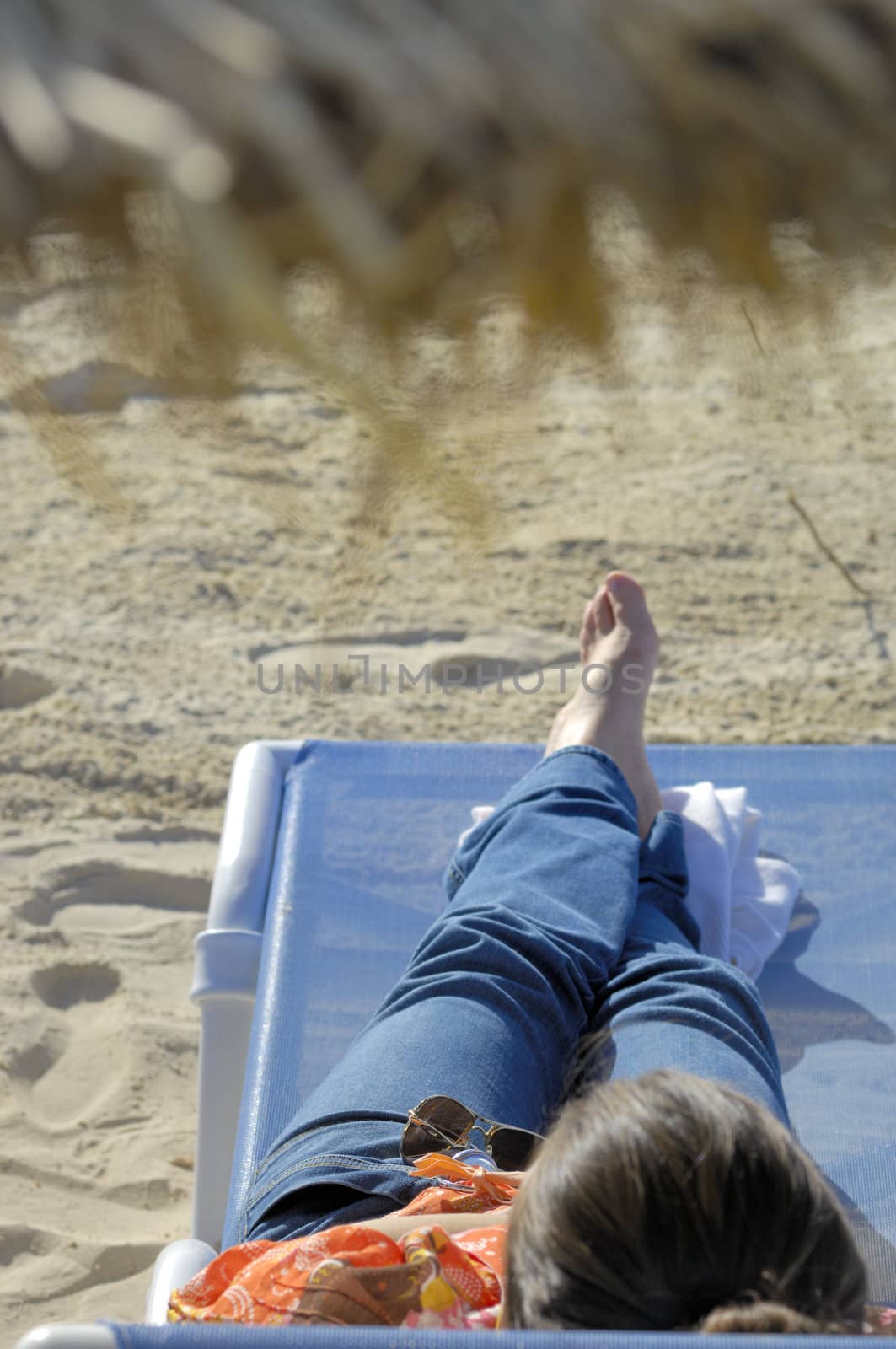 Woman relaxing on the beach