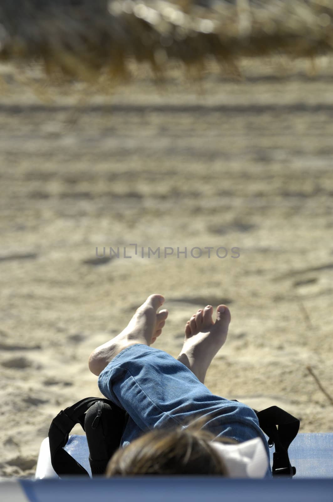 Woman relaxing on the beach