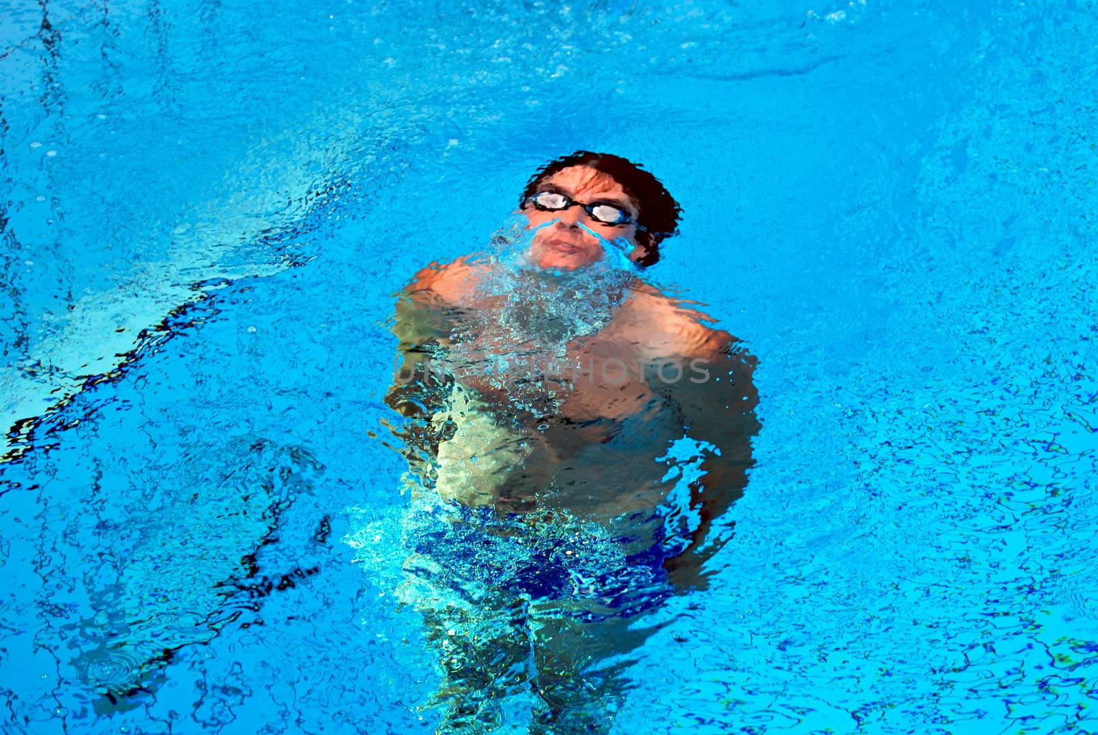 Swimmer going out of the water