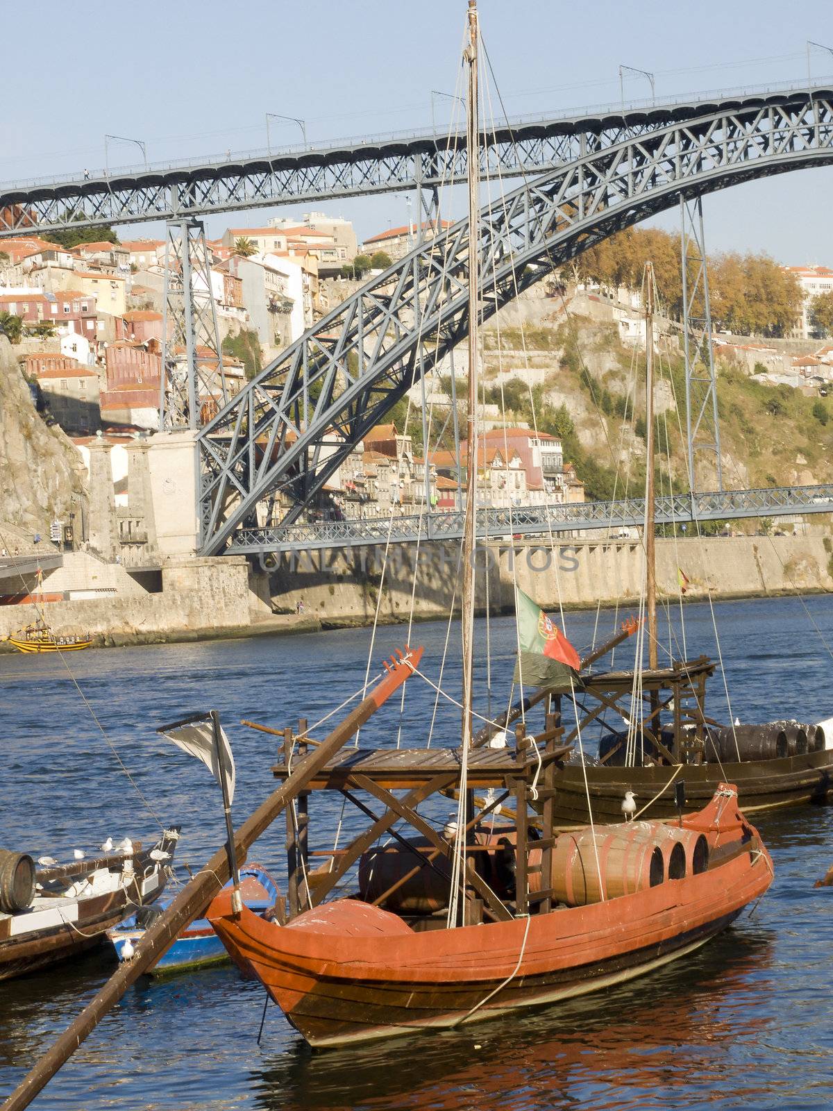 Cityscape with a typical portowine rebelo boat in the forground 