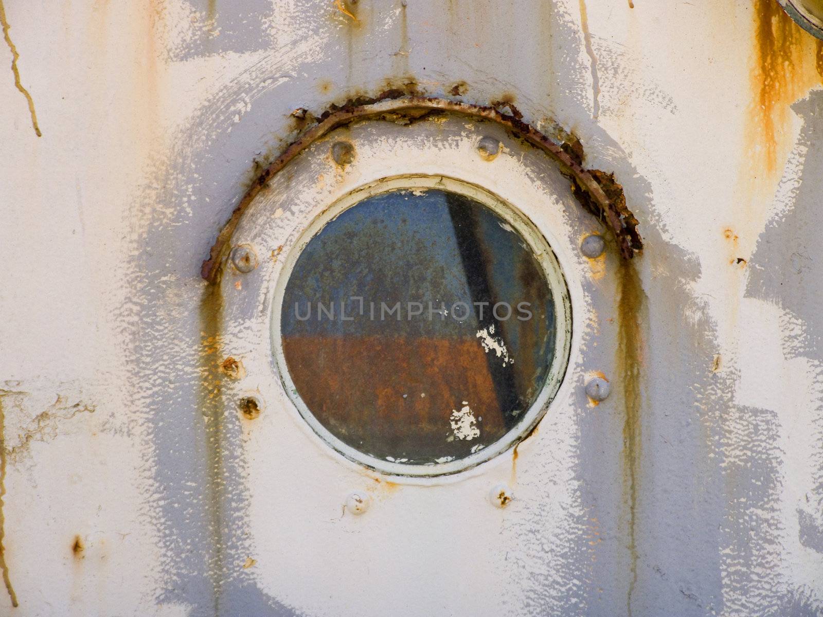 Detail on a rusty old ship window