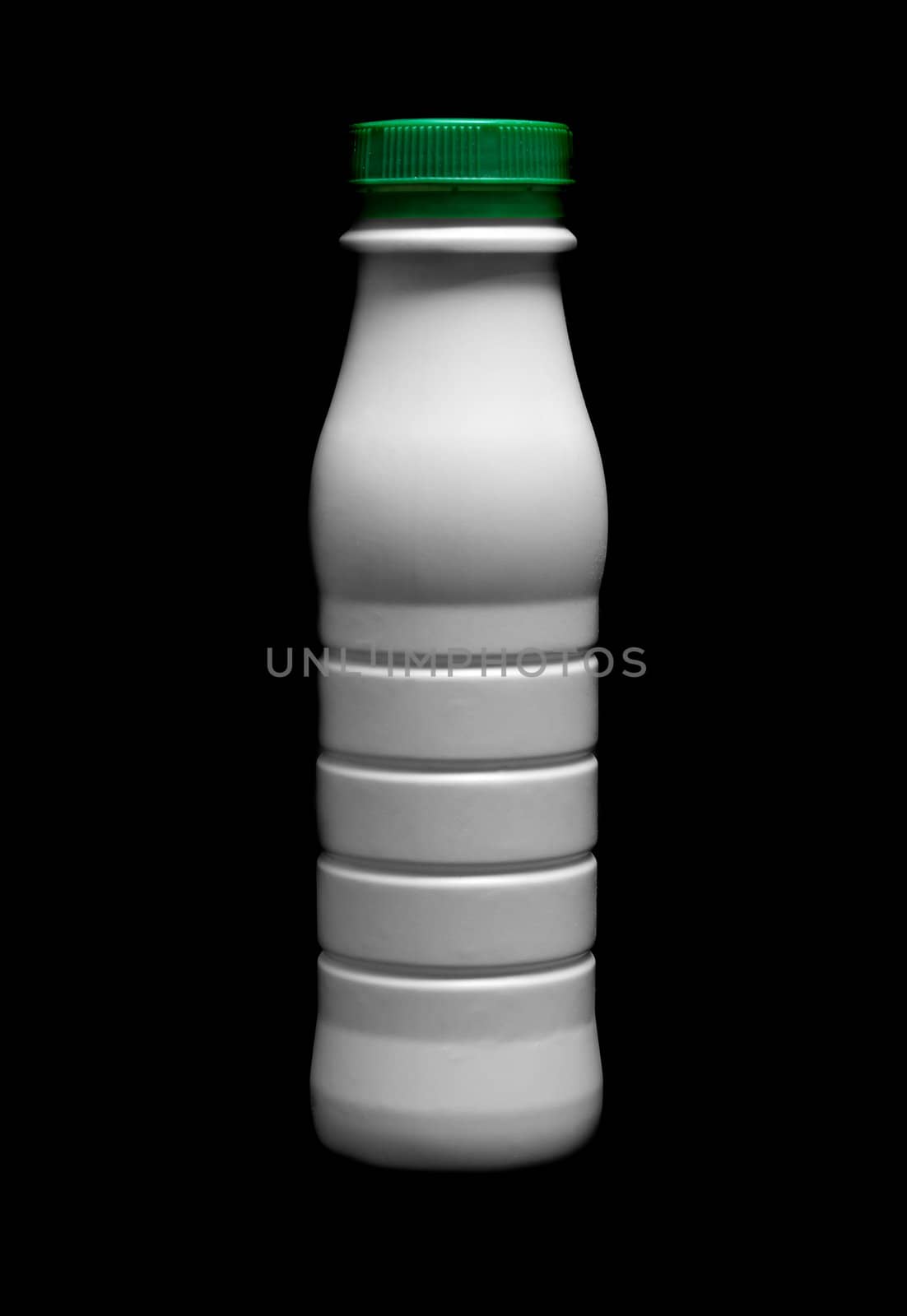 Generic bottle for diary products isolated on black background
