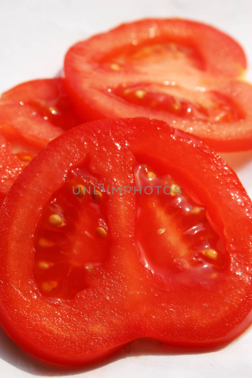 Juicy red tomato slices
