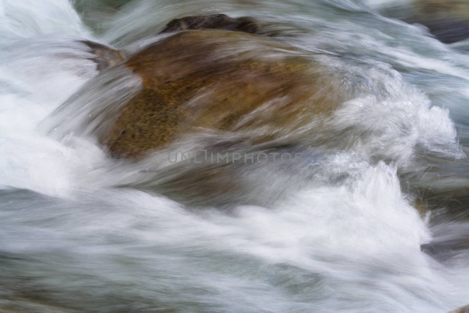 stone in river by foaloce