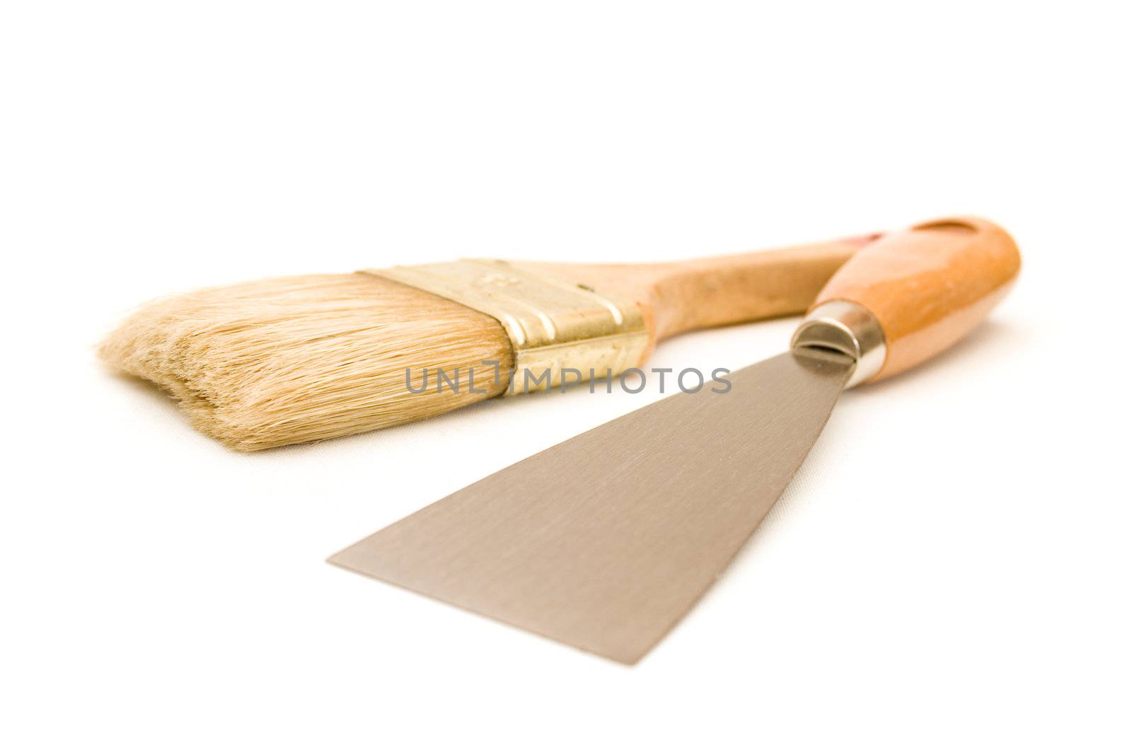 Paintbrush and putty knife by nubephoto