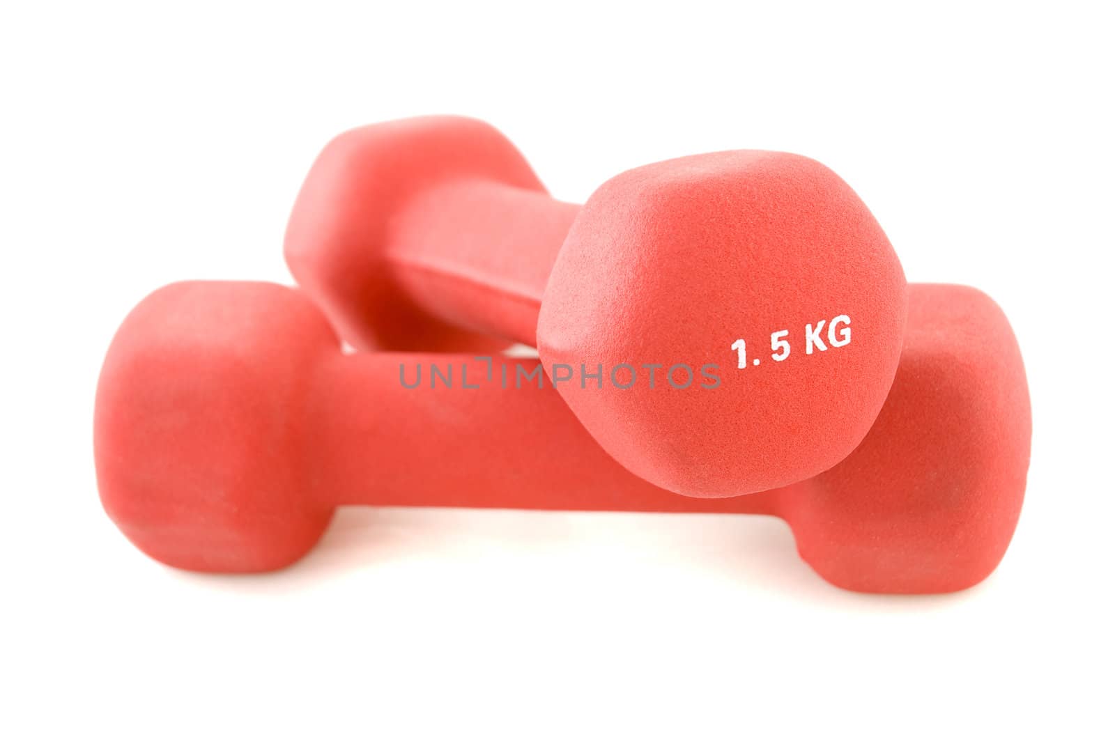 A pair of red dumbbells, isolated white