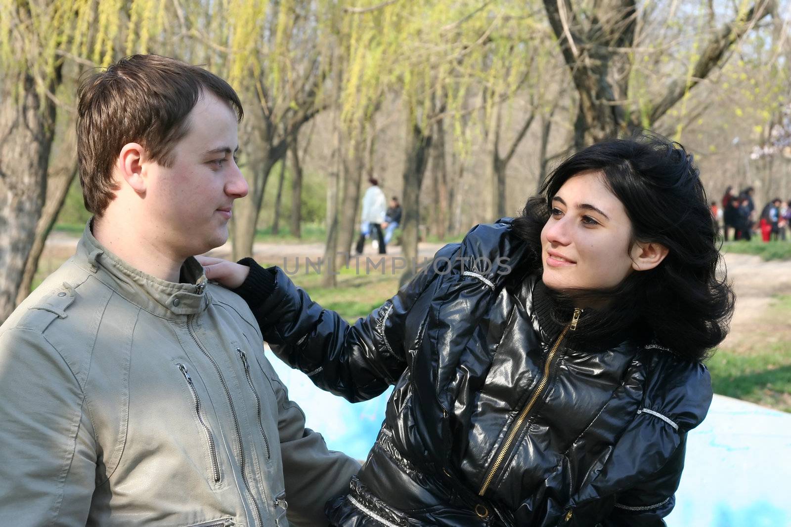 The loving couple walks on the nature