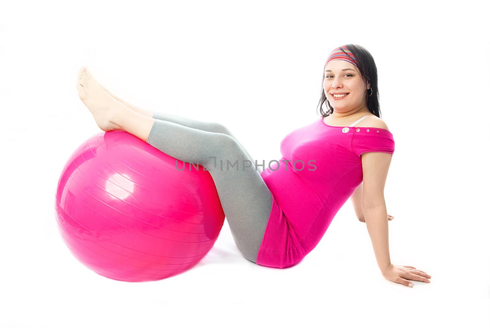 beautiful pregnant woman with a fitness ball by lanak