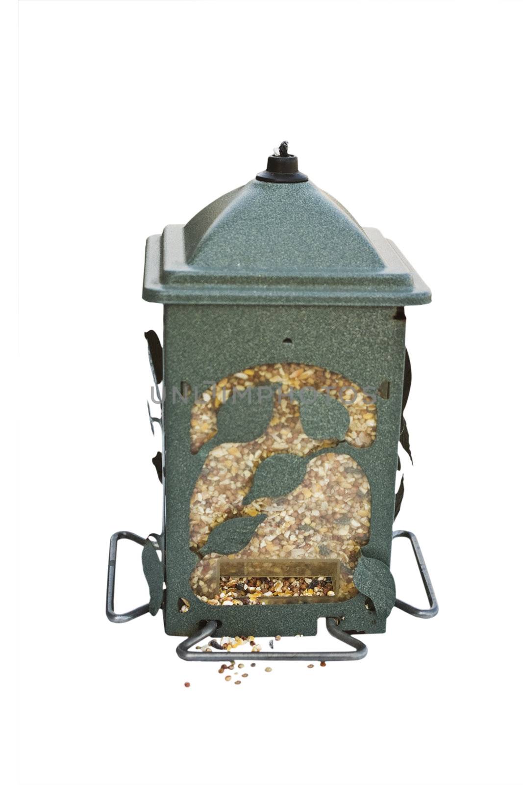 A garden bird feeder filled with seeds and isolated against a white background.
