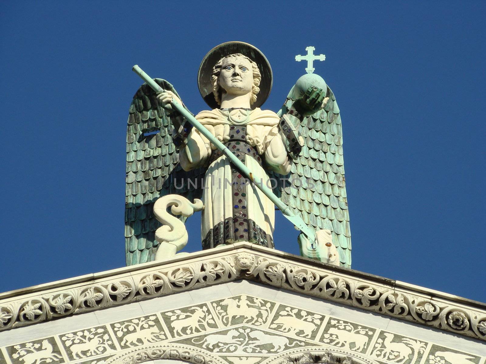 Close-up Of Architectural Detail On The Roof Of The Church
figure on St. Michele church in Lucca Tuscany Italy.2007