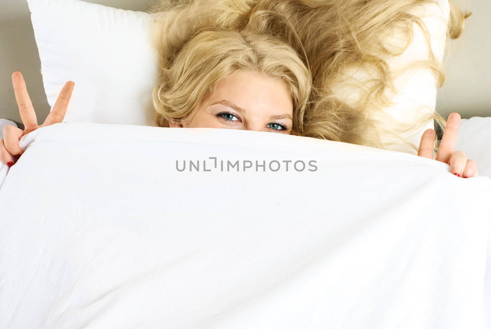 happy girl in bed by lanak