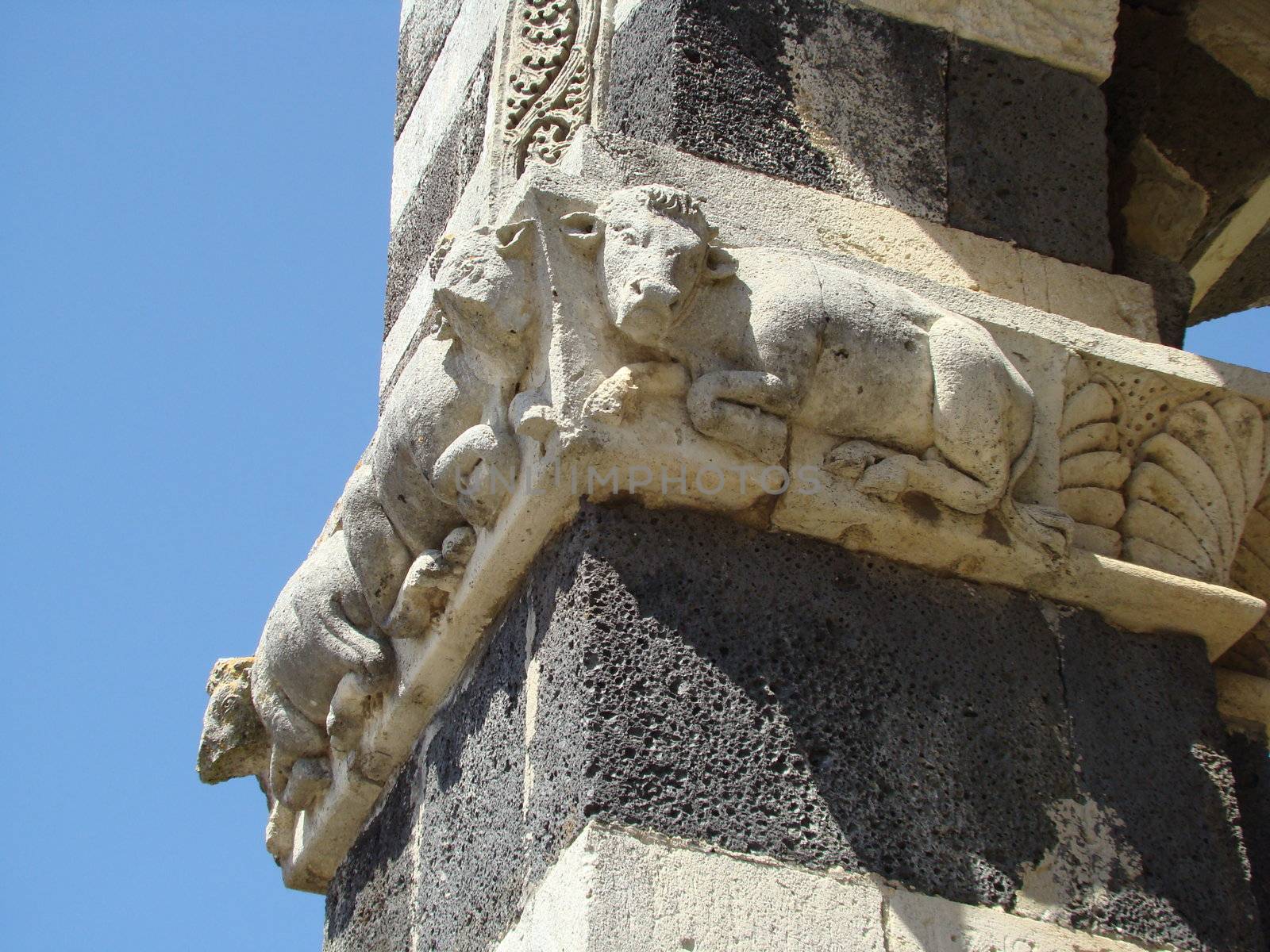 famous bas-relief with cow on pilar of
Basilica di Saccargia in Sardinia, Italy.
