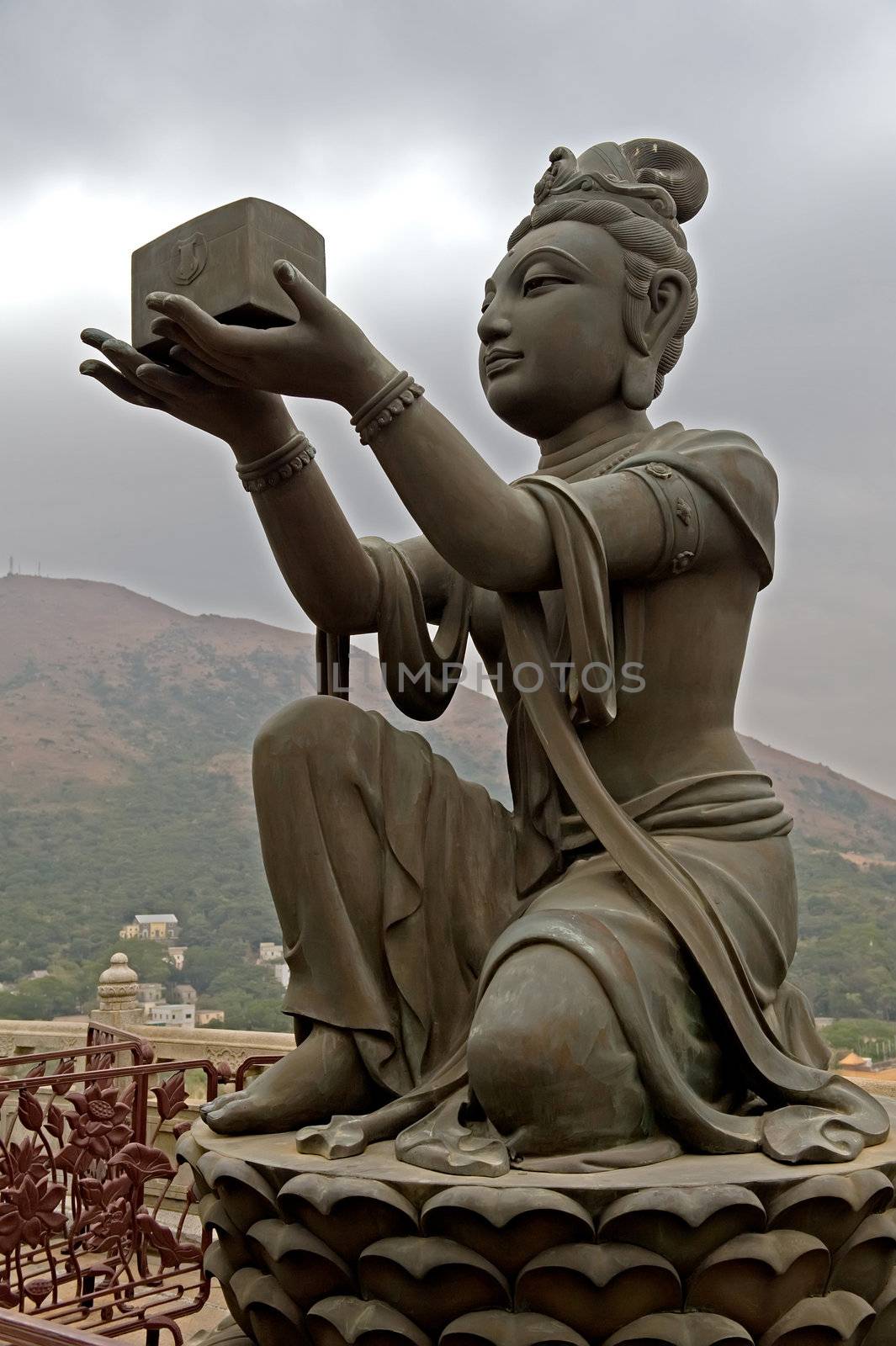 Statue In Front Of Buddha In Hong Kong by Marcus
