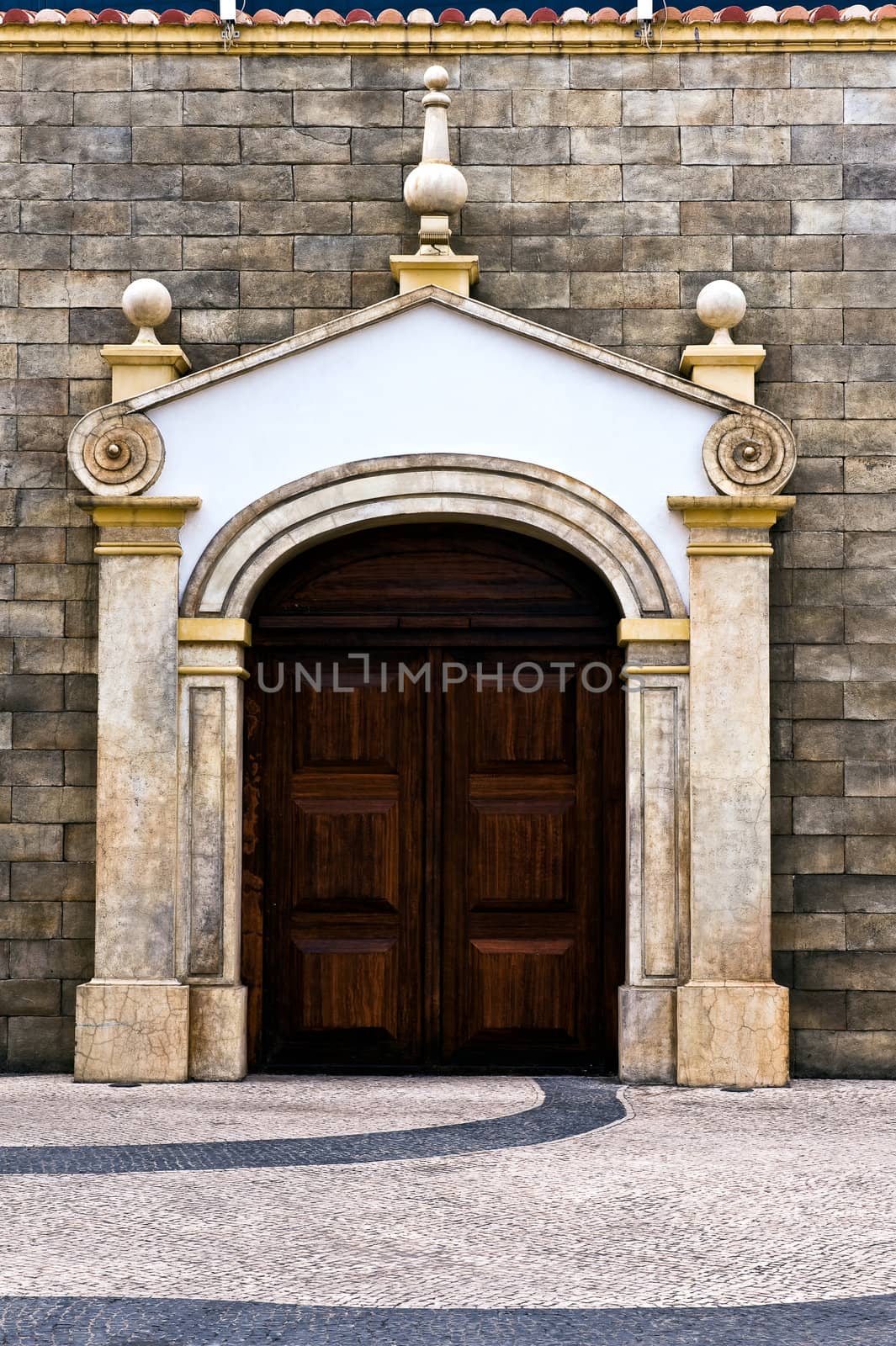 Historical entrance door with columns in Macao