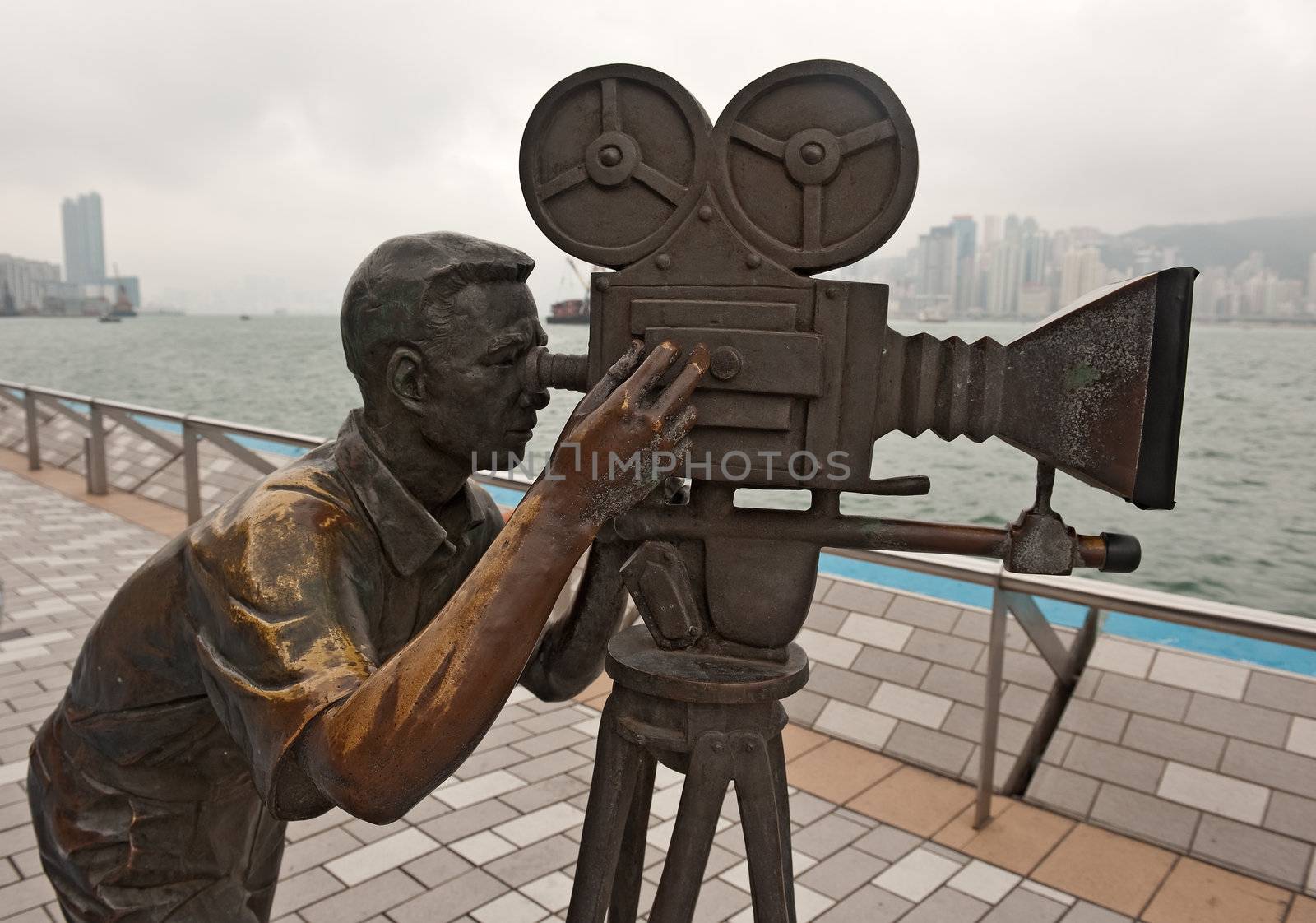 Bronze Cameramen statue in Avenue of stars in Hong Kong, Kawloon