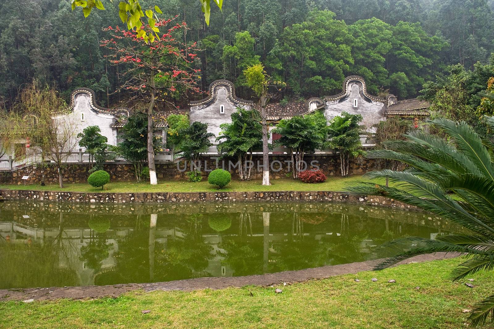 Baolin Temple in Shunde with water reflection and forest background near Guangdong China