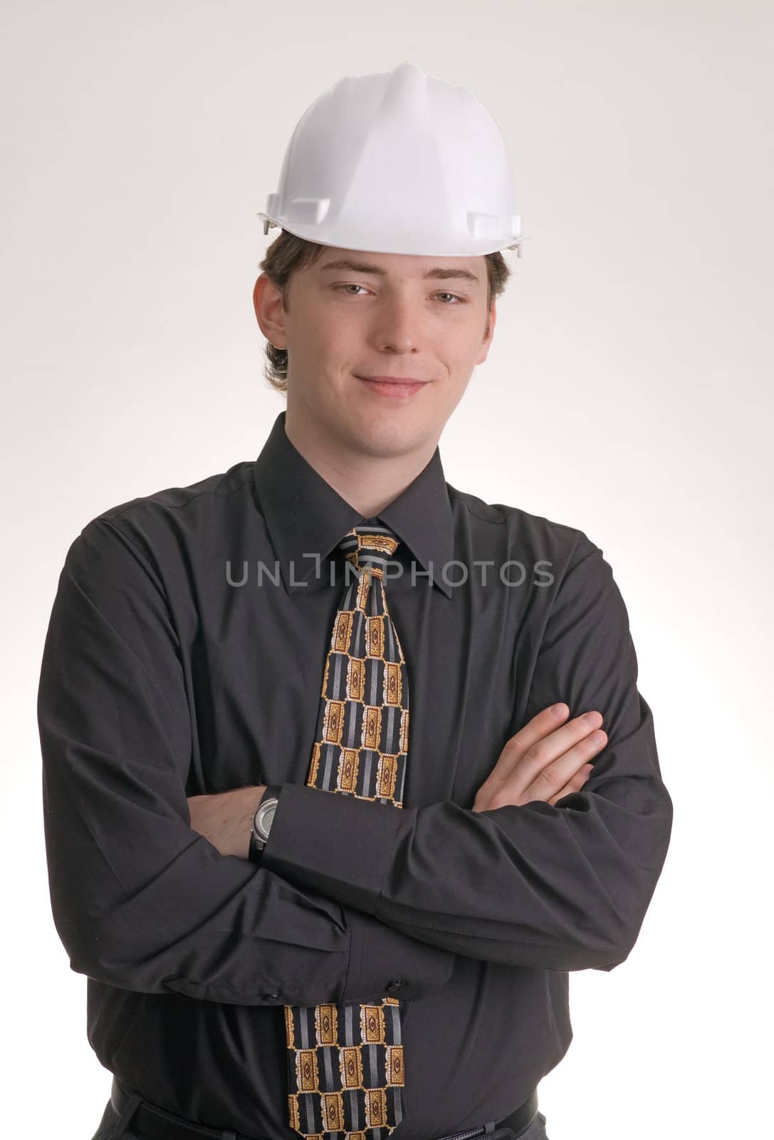 Portrait of young construction engineer with a smile on his face