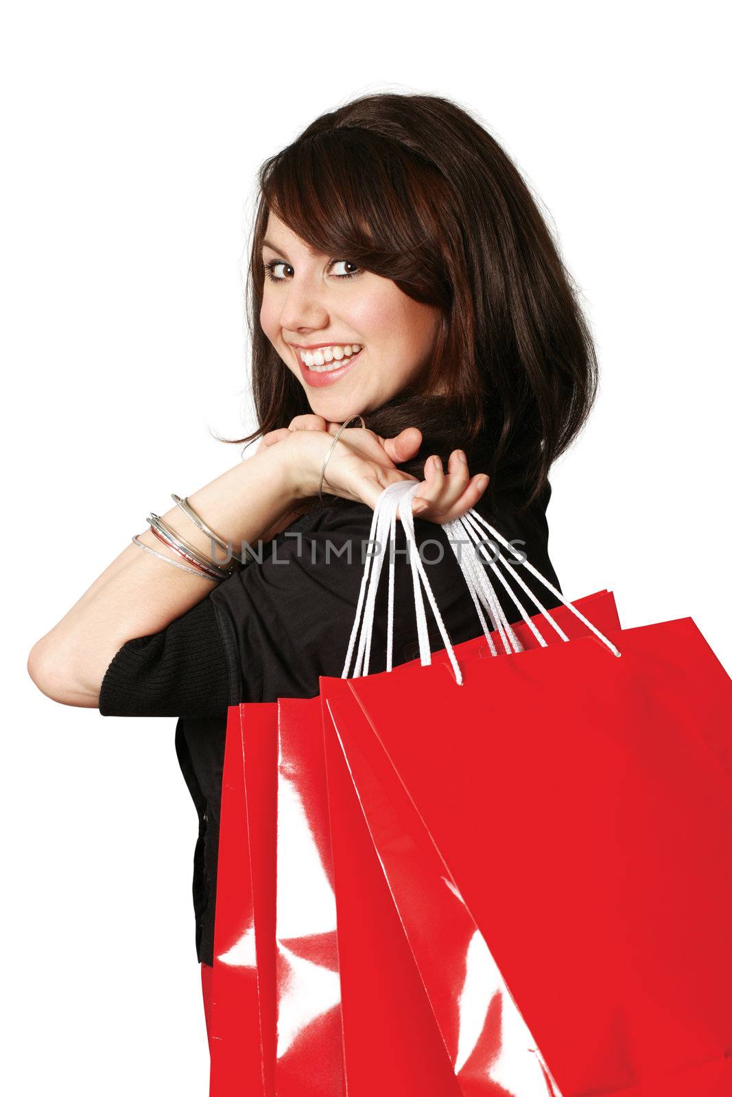 Happy shopper with shopping bags by sumners