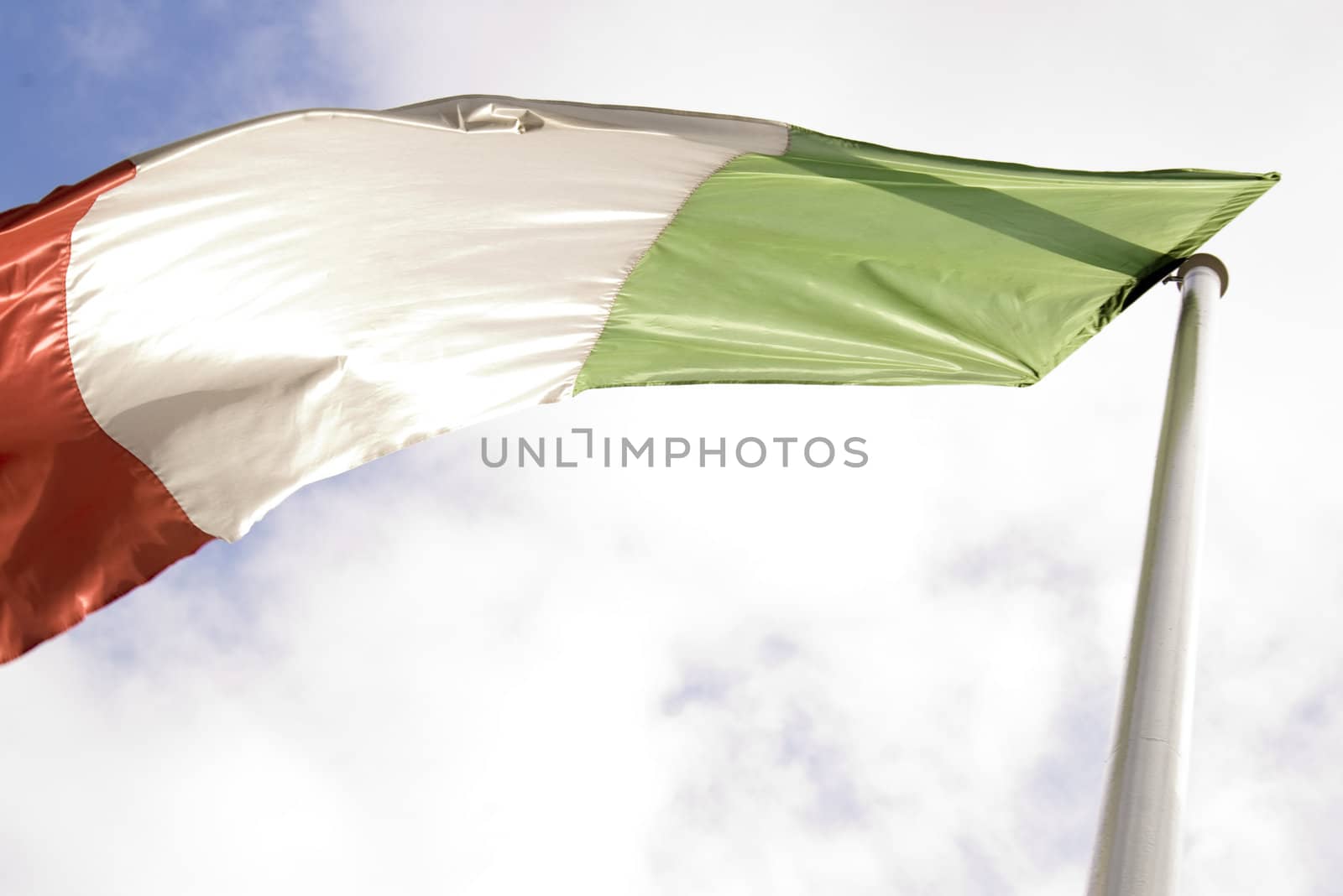 Italian flag on sky background