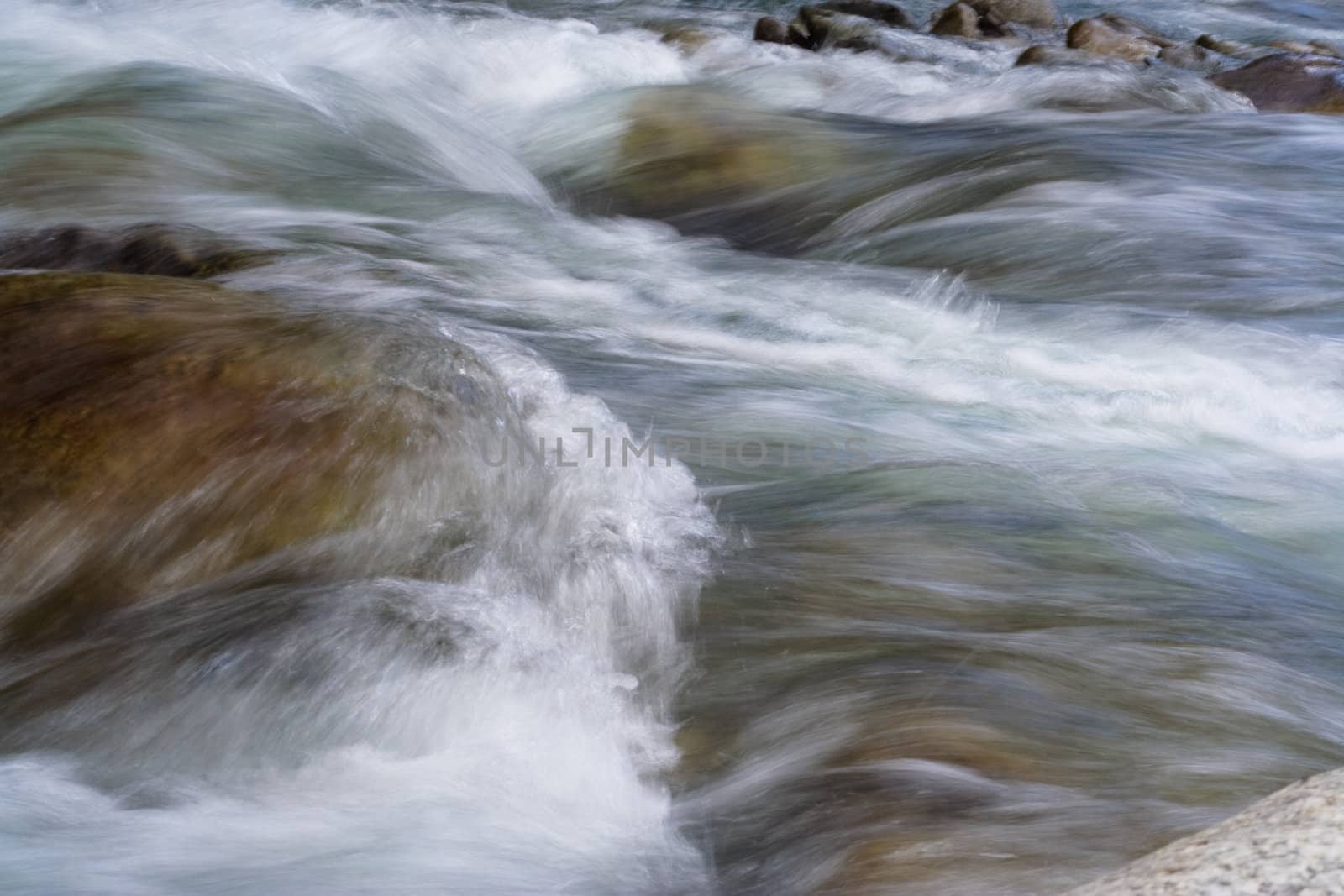 big stone in the stream 
