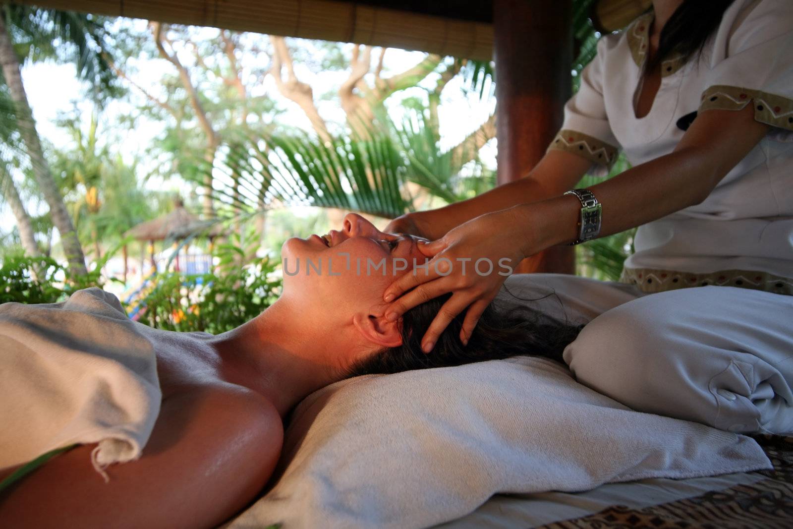 White woman on massage in Bali salon