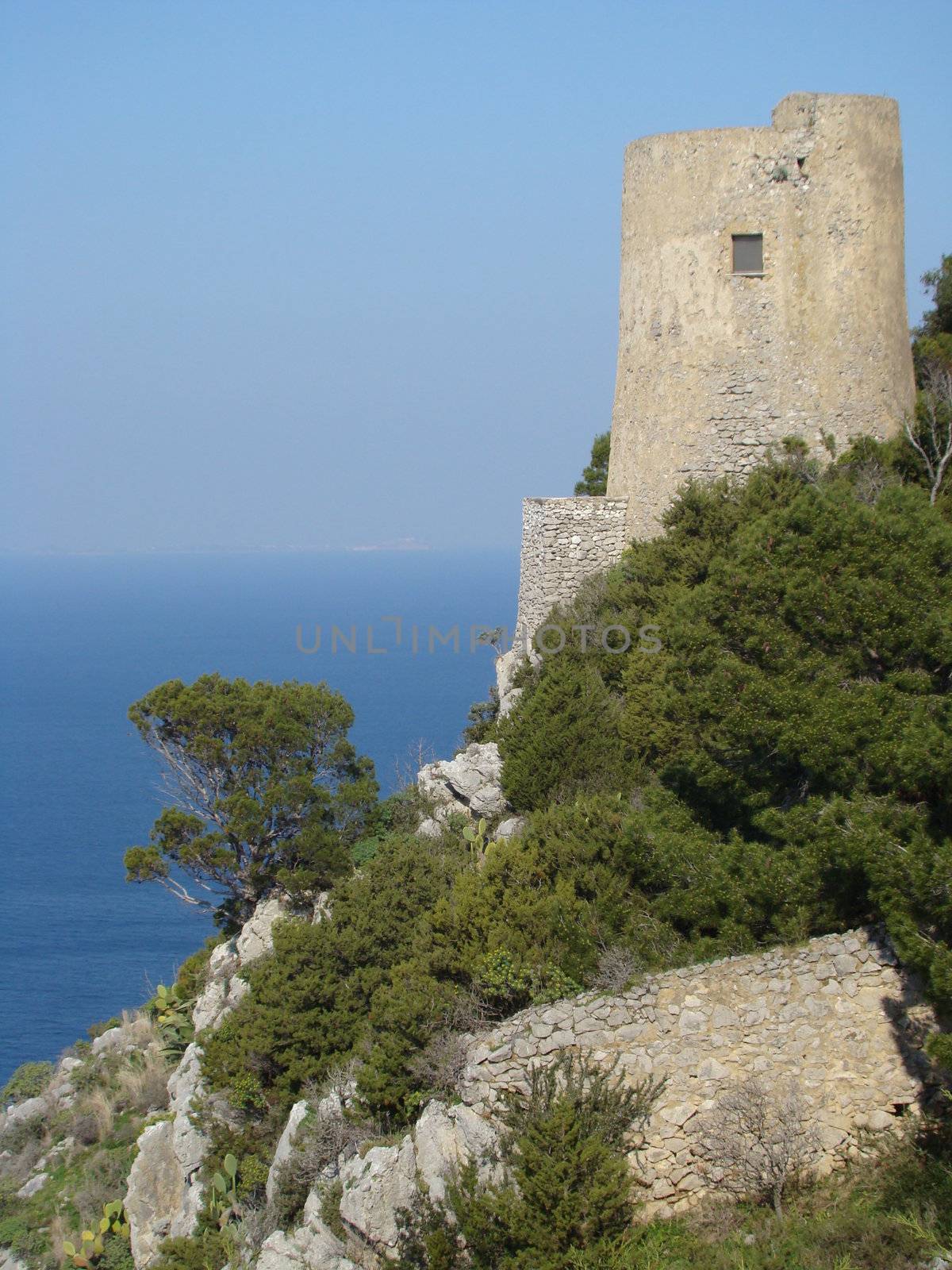 tower on cliff on Capri island, Anacapri part, region Campania, Italy,