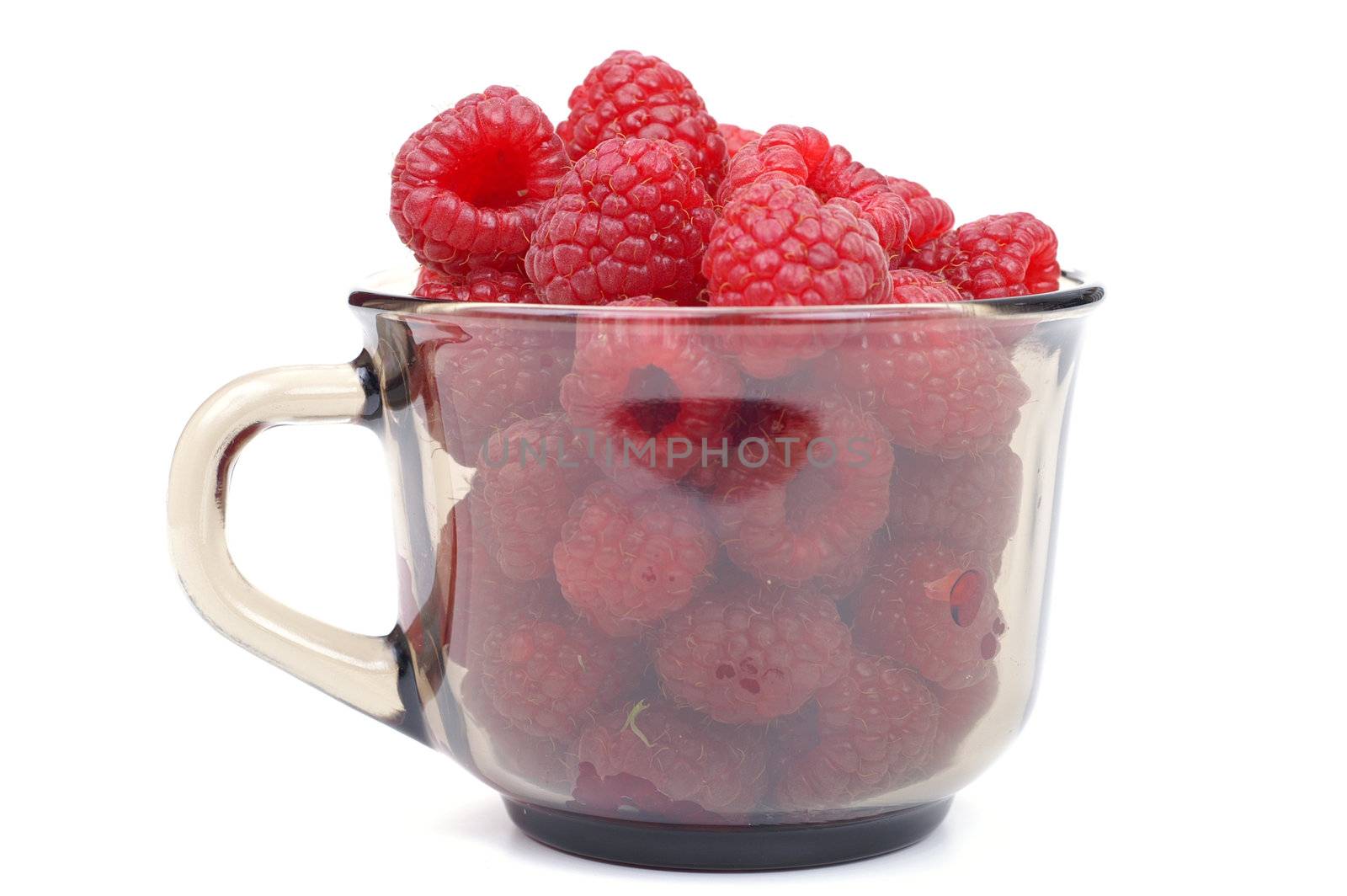 Raspberry on glass  cup