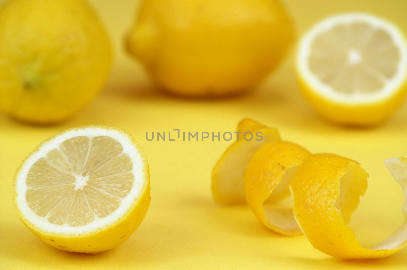 Lemons on yellow background