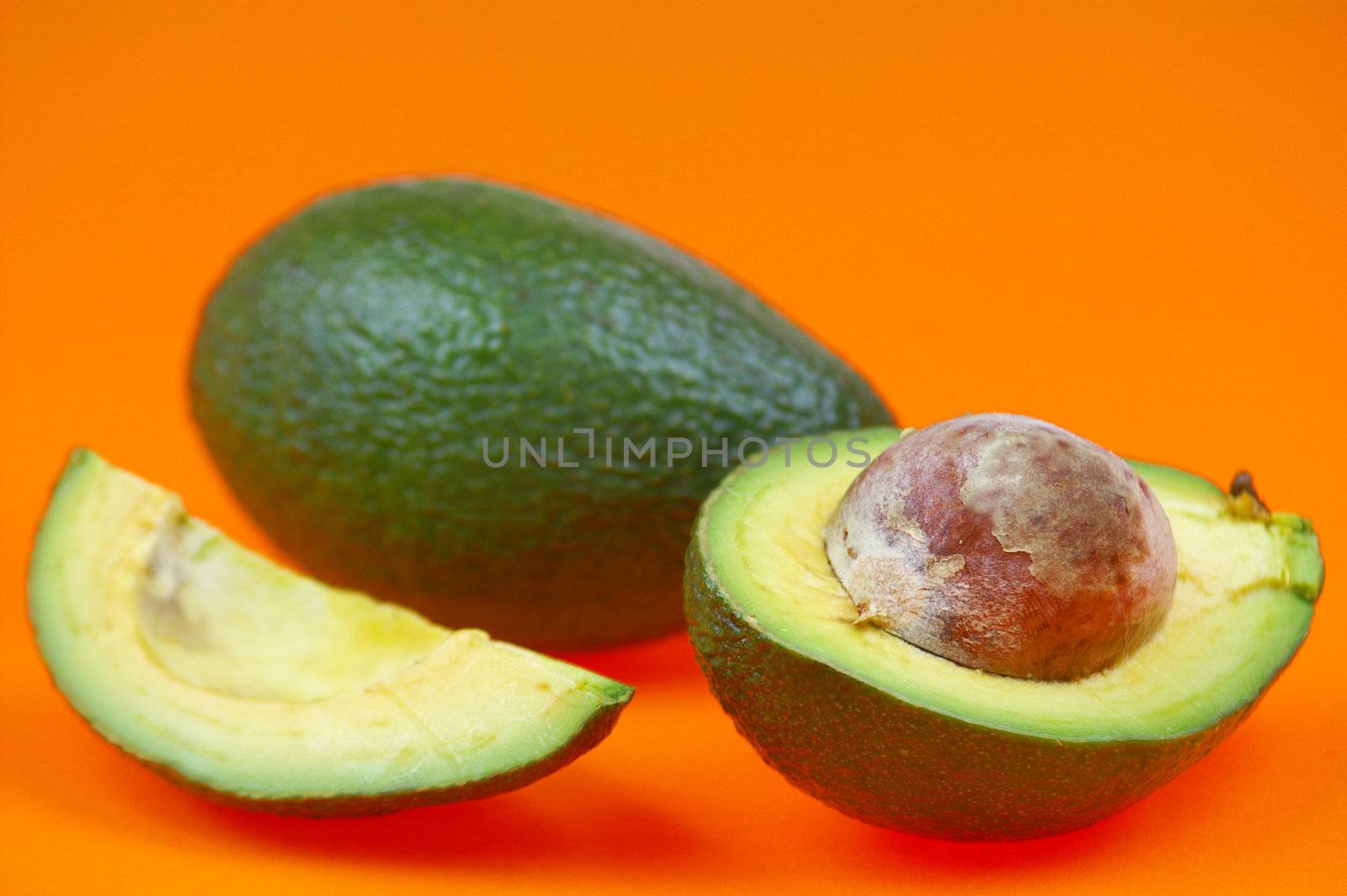 Avocado over orange