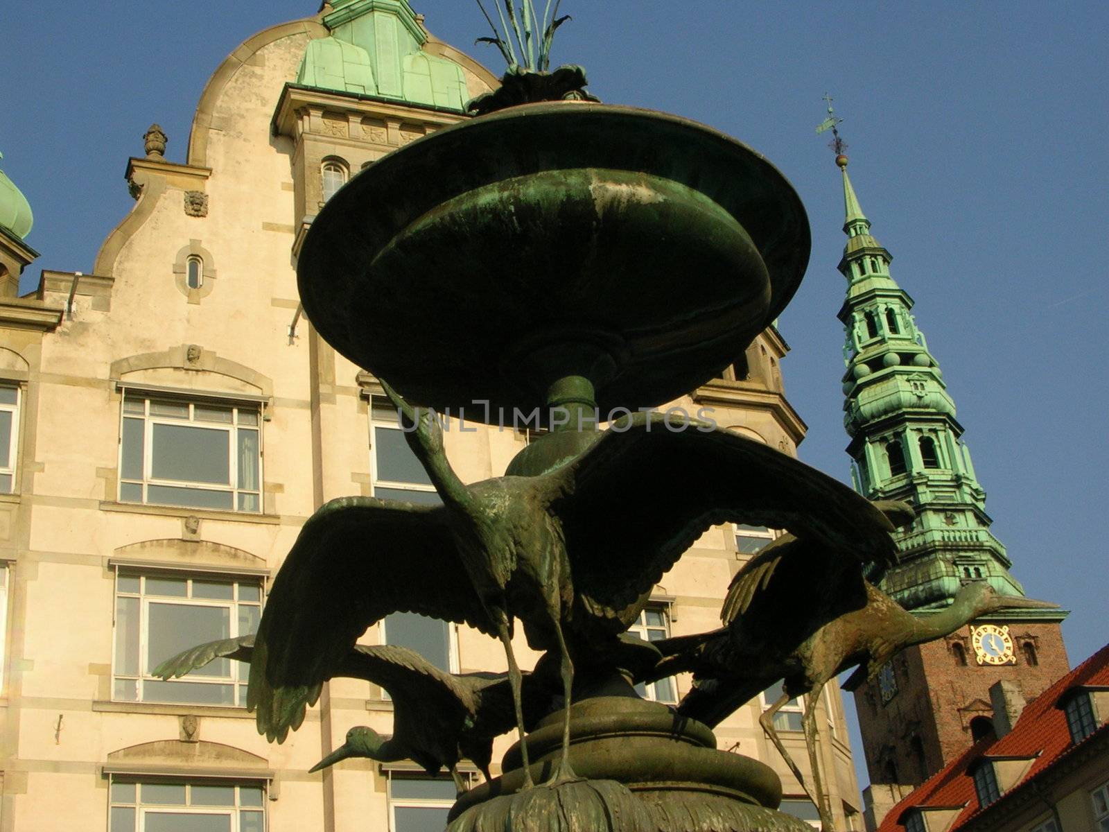 Fountain on square in central part of  Copenhagen, street Stroget