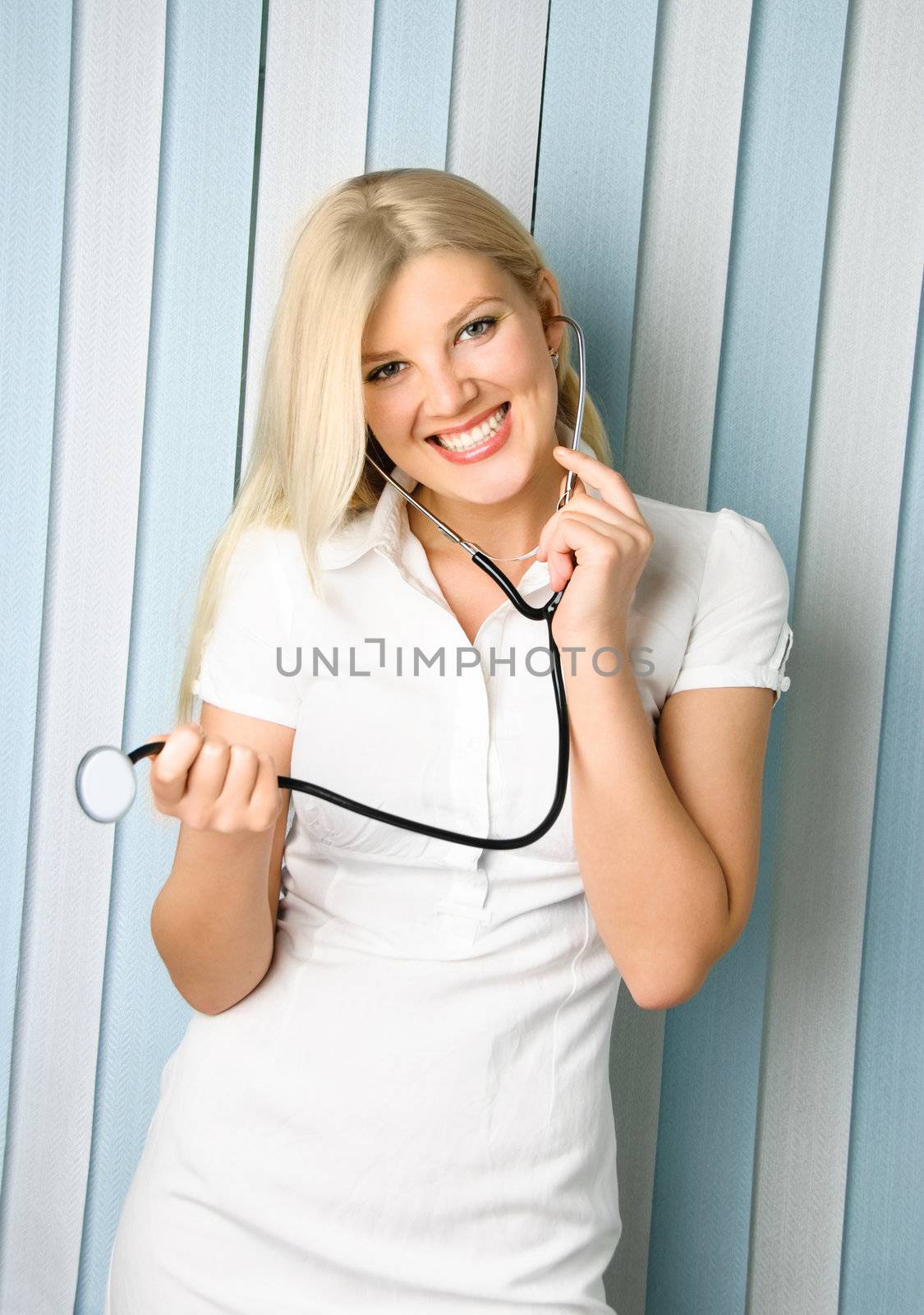 beautiful doctor with a stethoscope  by lanak