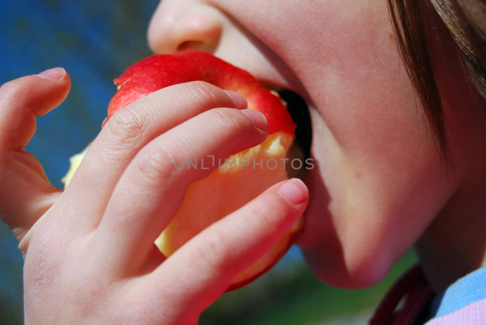 girl eats apple by leylaa