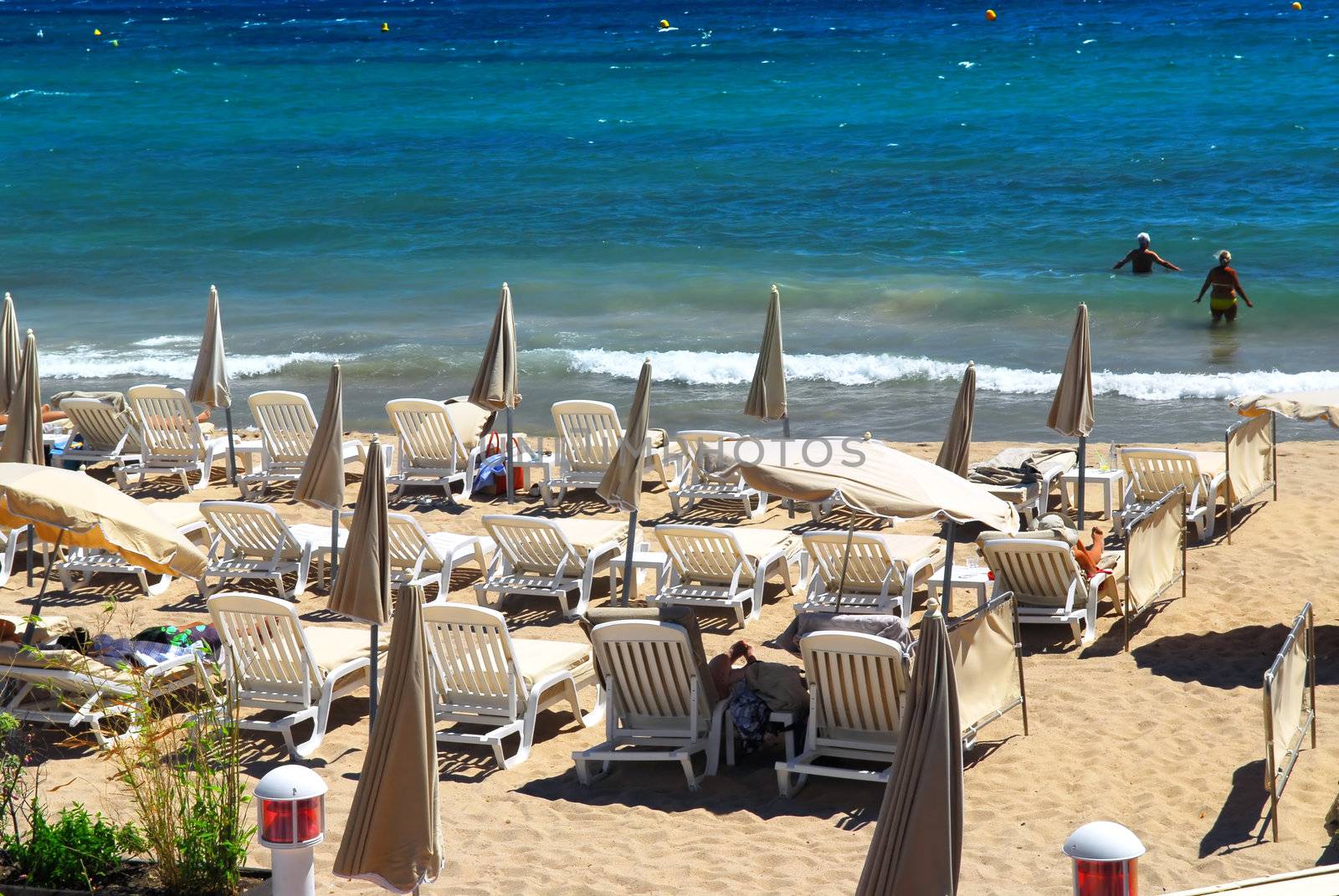 Sandy beach along Croisette promenade in Cannes France