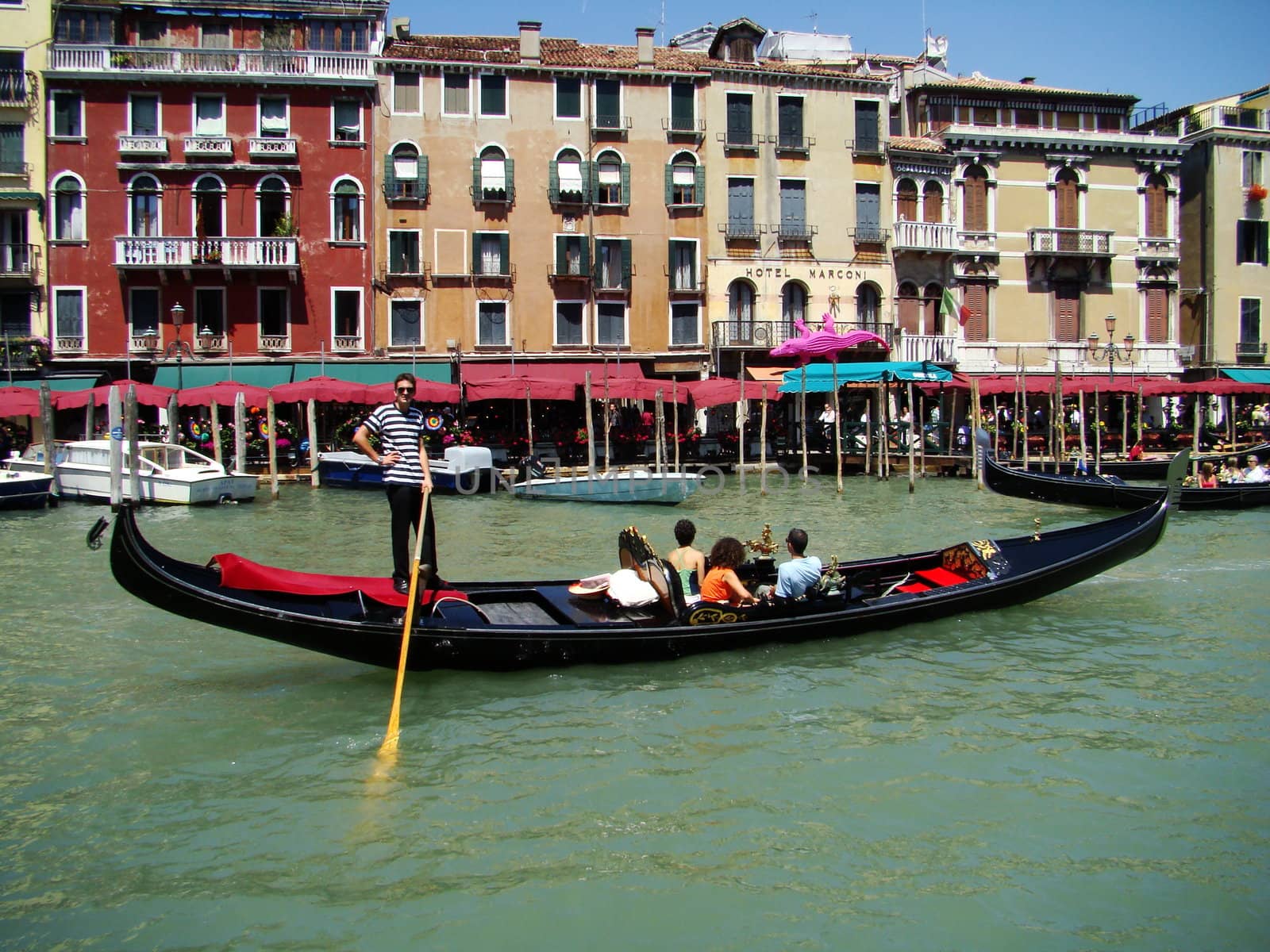 	
gondoliere on Canale Grande in Venice, Italy.