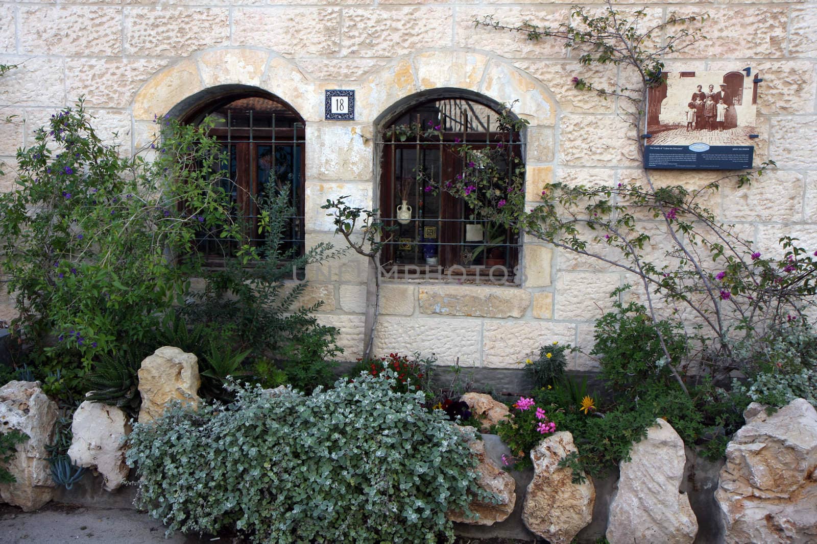 Small windows on a sreet of Jerusalem