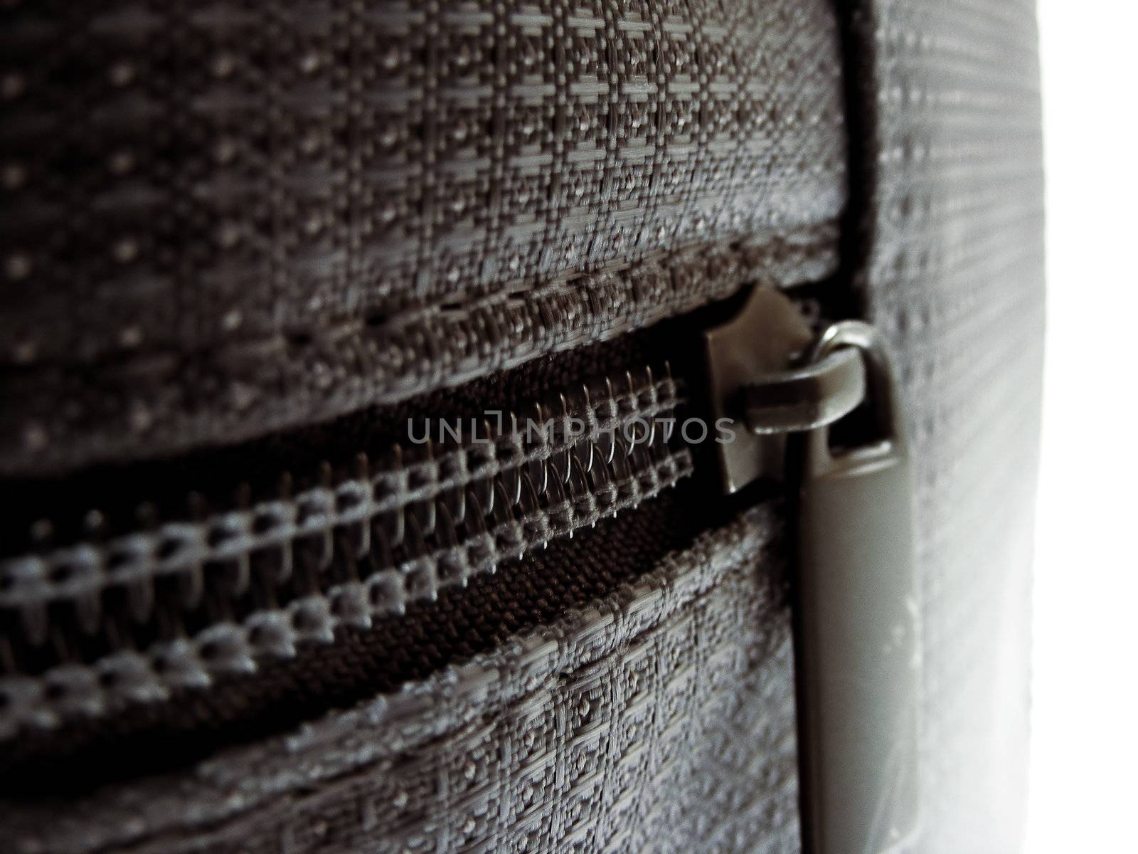 Close up of a grey carry bag for personal care items.