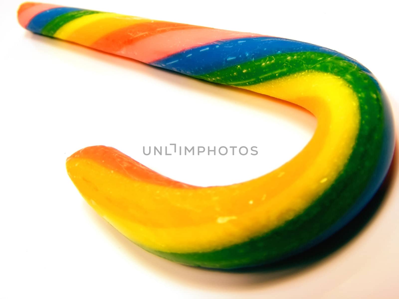 Multi-colored candy cane on a white background.