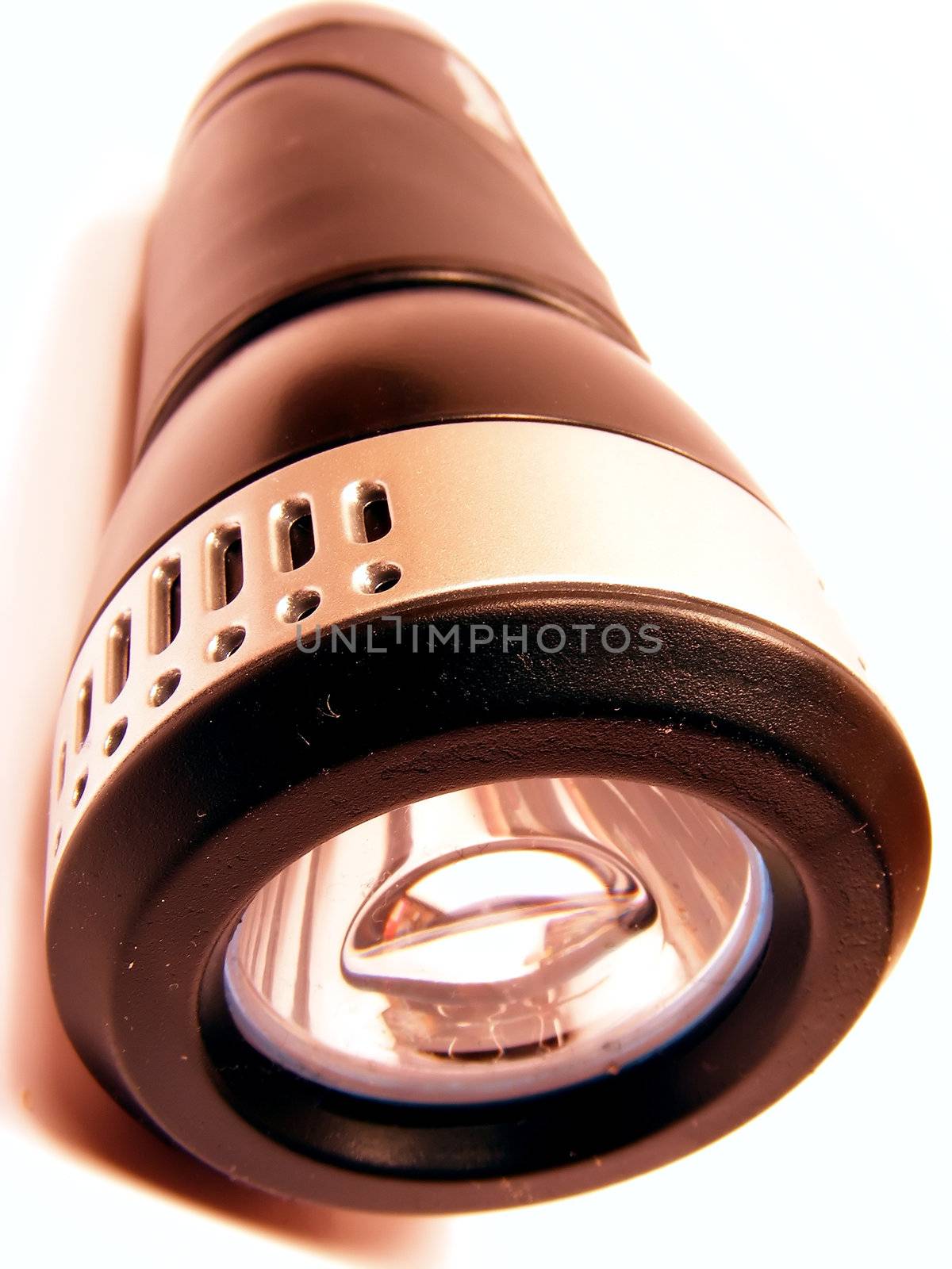 Led flashlight macro on a white background.