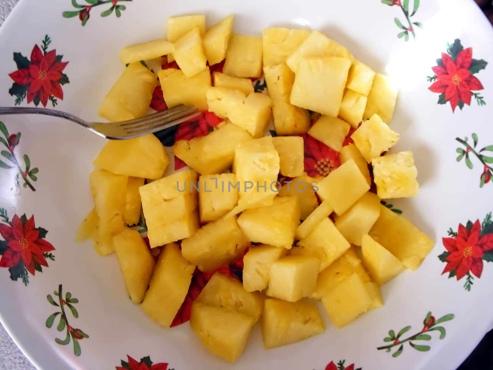 Chunks of pineapple served for hungry guests during the Christmas season.