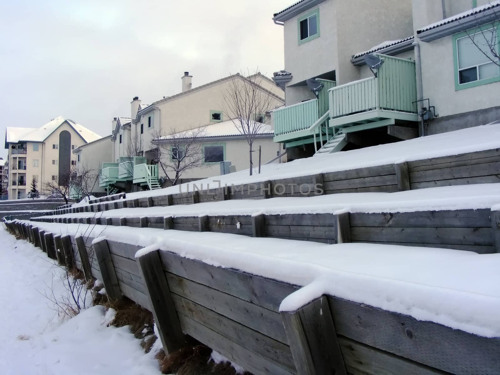 Row of townhouses on a winter afternoon.