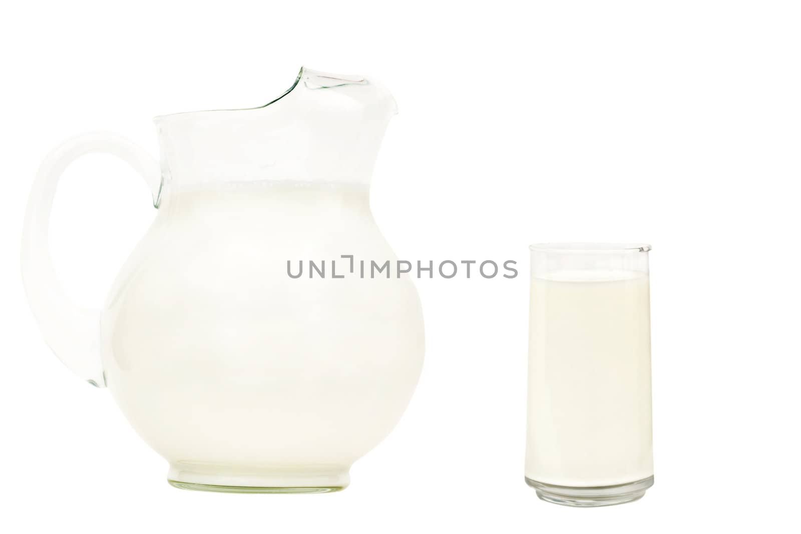 Glass pitcher of milk isolated on white by StephanieFrey