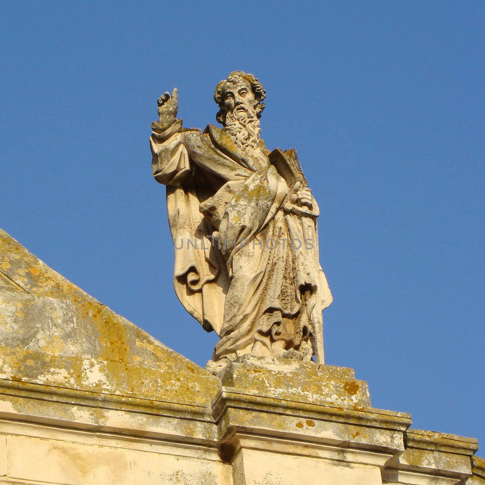 Figure on the roof of the church in Apulia region, Italy